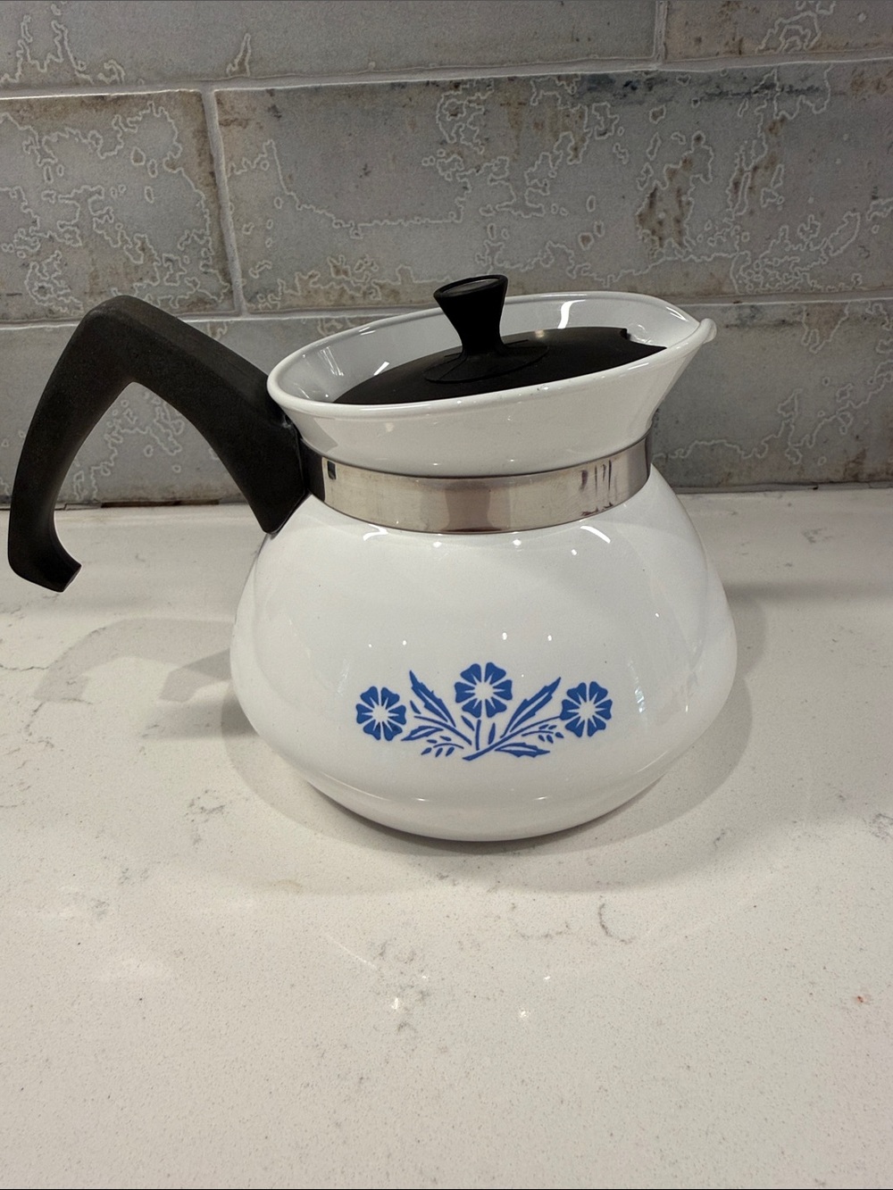 White Ceramic Corningware Teapot with Blue Floral Design and Black Handle